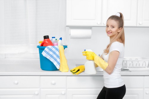 Local technician inspecting a carpet stain before treatment